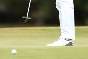 Players who use anchor long putters could be adversely affected by a ban. Photo / Getty Images