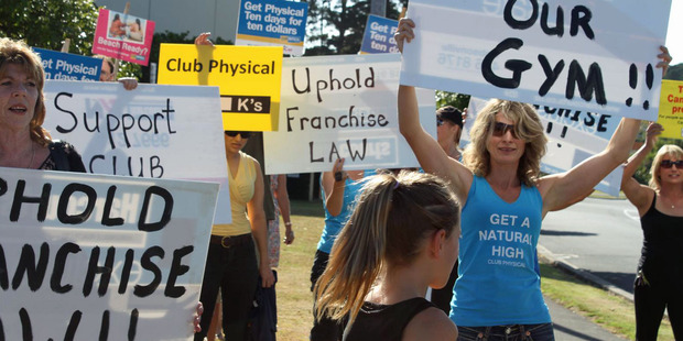 A group of loyal Club Physical gym members turned out to protest at Jolt Fitness in Westgate on Sunday. Photo / Supplied