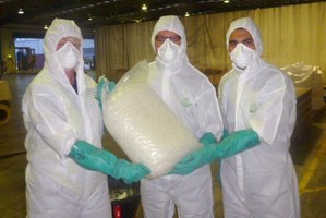 Australian Federal Police officers with some of their largest ever seizure of methamphetamine. Photo / AFP