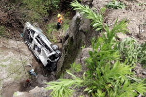 The wreckage of the van after it fell 15m from State Highway 5 near Te Haraoto. Photo / Paul Taylor