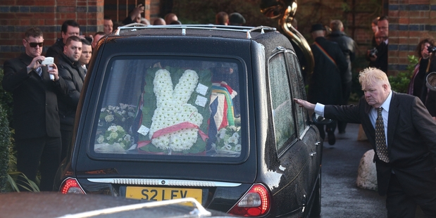 The coffin of Great Train Robber Ronnie Biggs arrives at Golders Green Crematorium. Photo / Getty Images