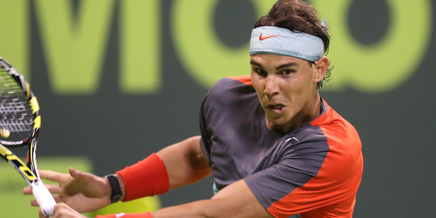 Rafael Nadal of Spain in action in his first round match against Lukas Rosol of Czech Republic during the Qatar ExxonMobil Open 2014. Photo / Getty Images