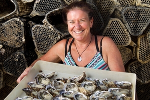 Anne Louden's enjoyment comes from introducing people to Coromandel's oysters and mussels. Photo / Alan Gibson