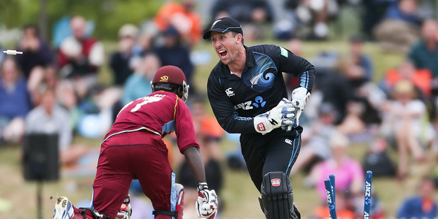 Luke Ronchi of New Zealand runs out Chadwick Walton of the West Indies during game four of the One Day International Series between New Zealand and the West Indies. Photo / Getty Images.