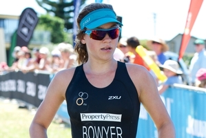 Aucklander Natasha Bowyer wins her first triathlon in Whangamata yesterday. Photo / Darryl Carey