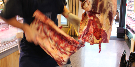 Separating the 'steak cuts' from the hindquarter.