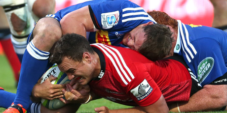 Israel Dagg of the Crusaders is tackled short of the try line during the round four Super Rugby match between the Crusaders and the Stormers. Photo / Getty Images.