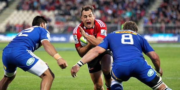Israel Dagg of the Crusaders is tackled by Damian de Allende (L) and Daniel Vermeulen of the Stormers. Photo / Getty Images.