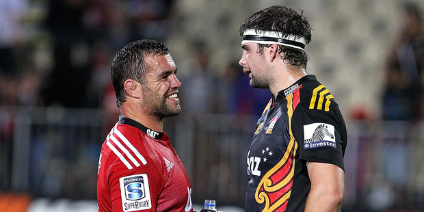 Corey Flynn (L) of the Crusaders talks to Matt Symonds (R) of the Chiefs after the round two Super Rugby match between the Crusaders and the Chiefs. Photo / Getty Images.