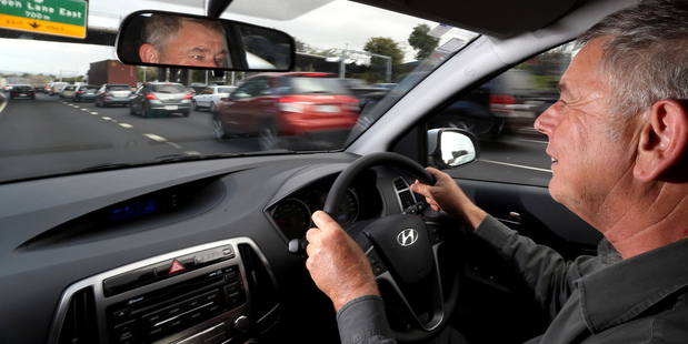Mathew Dearnaley takes to the road while assessed by ecodriver founder and trainer Mark Whittaker. Photo / Jason Oxenham