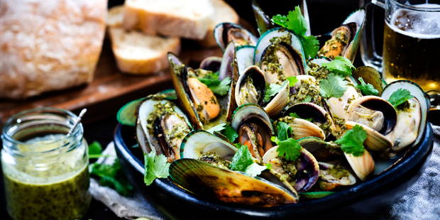 Coriander dressing with mussels and cockles. Photo / Babiche Martens.