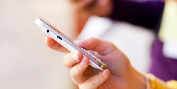 New Zealand's popular pre-paid mobile plans were 39 per cent cheaper than comparable OECD plans. Photo / Getty Images