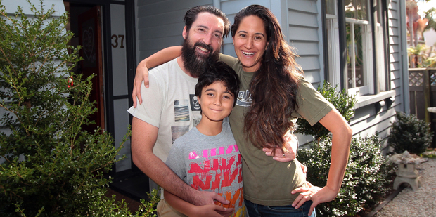 Josh Borthwick and Ush de la Croix, with son Wyatt, are happy with the sale. Photo / Doug Sherring