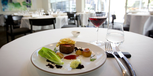 Smoked beef with lettuce hearts, caramelised onion, tarragon, crispy potatoes and charcoal at The French Cafe. Photo / Sarah Ivey