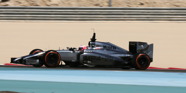 Formula One driver Jenson Button of McLaren speeds down the track during pre-season testing at the Bahrain International Circuit in Sakhir, Bahrain. Photo / AP