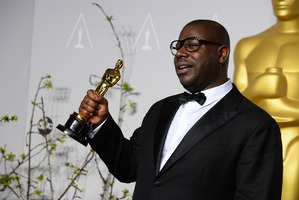 Director Steve McQueen with his award for best picture for 12 Years a Slave. (Photo AP)