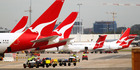 Qantas aircraft on the tarmac at the domestic terminal at Sydney Airport. Photo / Bloomberg