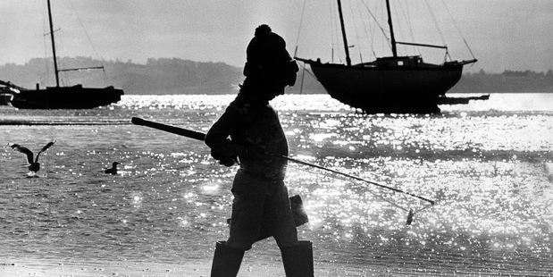 Now a 42-year-old mum of four, Felicity (four years old in this pic) remembers long blissful days exploring the estuary. Photo / NZ Herald, Photo Research / Emma Land