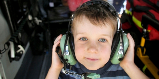 Nathan Smith, 5, from Hastings steps inside the Lowe Corporation Rescue Helicopter at their open day. Photo/Warren Buckland