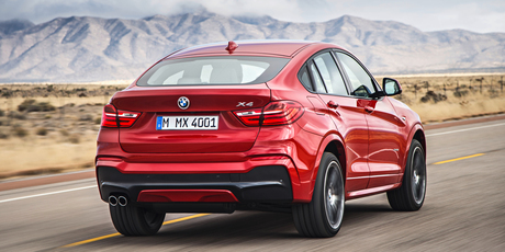 BMW X4 is a sportier derivative of the X3 with a silhouette that's reminiscent of a coupe and a slightly more aggressive-looking body.