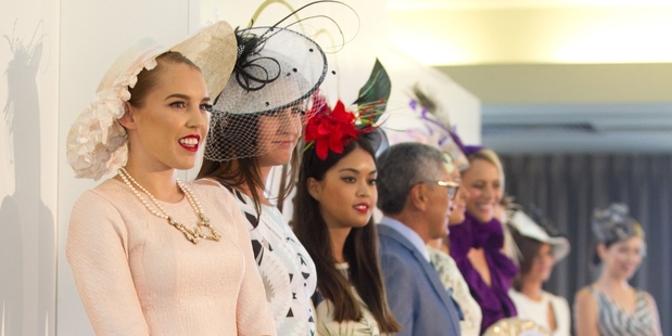 Herald reporter Morgan Tait (left) lines up in the Prix de Fashion at the TV3 NZ Derby Day at Ellerslie on Saturday. Photo / Richard Robinson