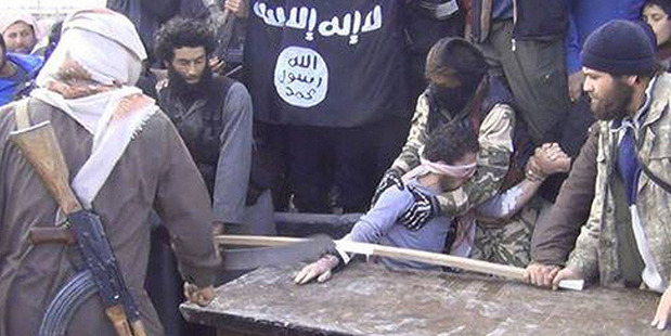 An image posted to Twitter of a man's hand apparently being removed by the Syrian militant group Isis.