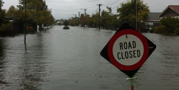 Flooding in Carrick Street, St Albans. Photo / Matty Coleman