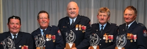 Haumoana Volunteer Fire Brigade senior firefighter Phil Evans (left), senior firefighter Kevin Cushing, senior firefighter Chris Dear, station officer Graham Arthur and senior firefighter Stuart Sinclair received the New Zealand Fire Service Gold Star. Photo/Duncan Brown