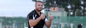 Tony Lamborn gives himself the thumbs up during Saturday night's pre-meeting parade.