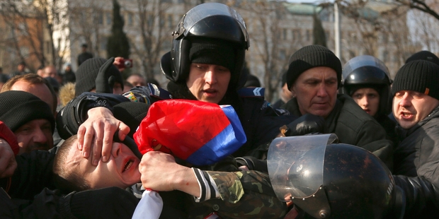 Police detain a demonstrator during a pro-Russian rally in the eastern Ukraine city of Donetsk yesterday. Photo / AP