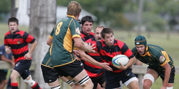 Hikurangi's Dan Torbridge forces his way forward against Mid Western in his side's 22-16 loss. Photo/Ron Burgin
