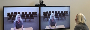 Acting chamber chief executive Anne Pankhurst demonstrates the new Chamber-Vodafone videoconferencing centre.