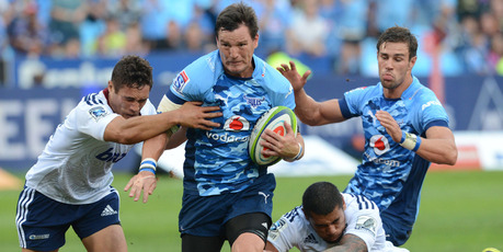 Jacques-Louis Potgieter of the Bulls gets past Jackson Willison of the Blues during the Super Rugby match between Vodacom Bulls and Blues. Photo / Getty Images.