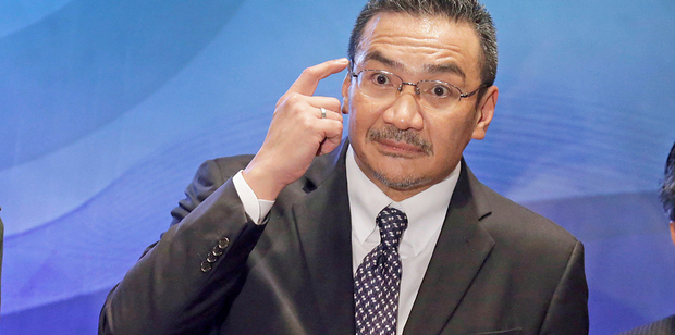 The Acting Minister of Transport turned defensive when an exasperated Malaysian reporter asked why the facts kept changing. Photo / AP