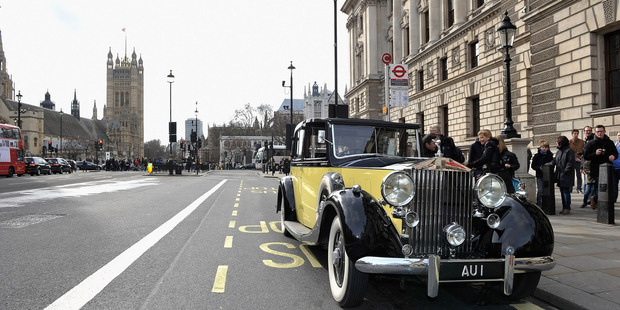 The Rolls-Royce Phantom III driven by Bond villain Odd Job in Goldfinger is among the collection for sale. Pictures / Getty Images