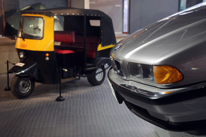A tuk tuk from Octopussy and BMW750iL used in Tomorrow Never Dies.