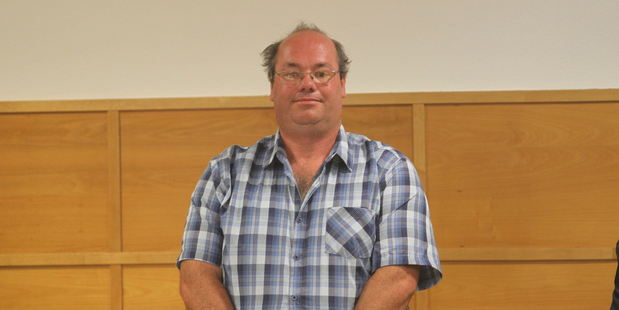 Allan Francis Barlow in Tauranga District Court today on charges of attempting to procure a special duties police officer to murder his parents