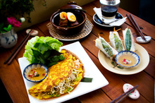 Rice flour crepe, pork hot pot and rice paper rolls at Cafe Viet. Photo / Babiche Martens.