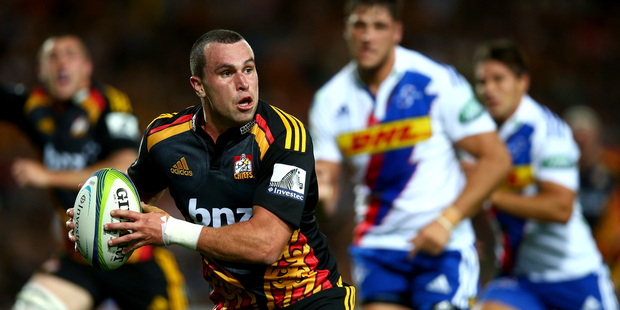 Tom Marshall of the Chiefs runs the ball during the round five Super Rugby match between the Chiefs and the Stormers at Waikato Stadium. Photo / Getty Images.