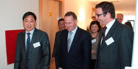 Donghua Liu, left, with John Key at the opening of first stage of the construction project in Newmarket.