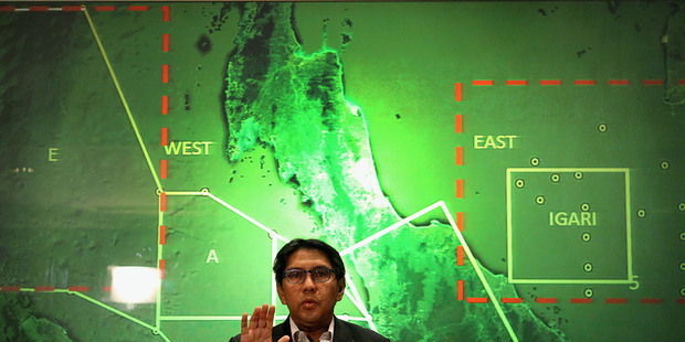 Malaysia's Department of Civil Aviation's Director General Azharuddin Abdul Rahman briefs reporters on search and recovery efforts. Photo / AP