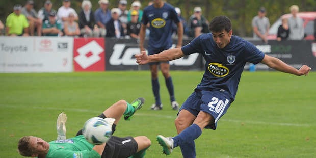 Auckland's Emiliano Tade kicks for goal. Waitakere United vs Auckland City FC, ASB Premiership semi-final first leg, Fred Taylor Park, Whenuapai, Auckland. Photo / Jason Dorday.