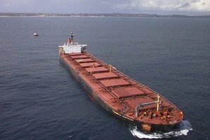 The Japanese-owned bulk iron sand carrier the Taharoa Express anchored off the coast of the North Island of New Zealand.