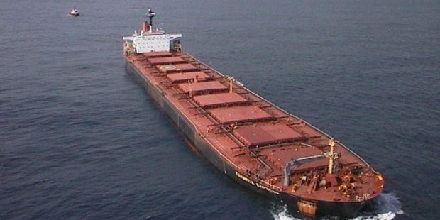 The Japanese-owned bulk iron sand carrier the Taharoa Express anchored off the coast of the North Island of New Zealand.