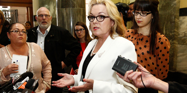 Justice Minister Judith Collins during her stand-up press conference where she revealed she had dinner with the head of Oravida while in China last year. Photo / APN