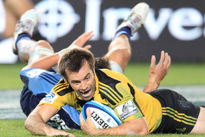 Hurricanes captain Conrad Smith celebrated his 100th Super Rugby game with a win. Photo / Greg Bowker