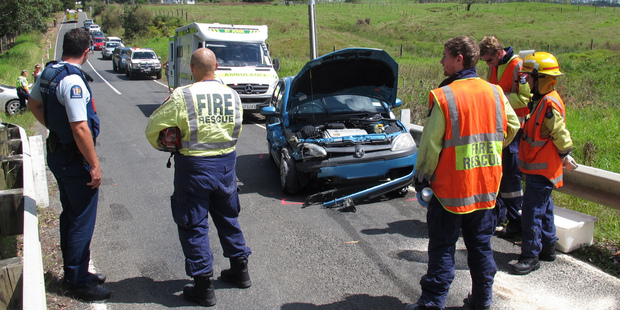 Emergency services at the scene of today's crash on a one-lane bridge near Kerikeri.