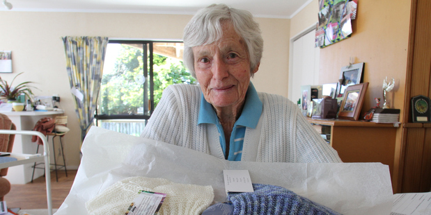 Rural Women New Zealand's Waihtawheta branch president Frances Bicknell with the two wool singlets to be given to Prince William and Kate on their visit to New Zealand