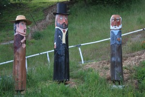 Wooden statues commemorate the first discovery of gold in the area. Photo / Paul Rush