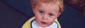 Kronos Grosney died after he was run over in a driveway accident. His great-uncle has appeared in court.